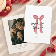 Carte de Noël avec nœud rose et vœux chaleureux