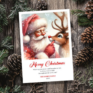 Carte de Noël avec un Père Noël joueur et Rudolph