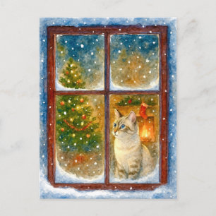 Carte de Noël de chat d'hiver confortable près de