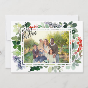 Carte de Noël photo avec cadre de verdure et baies