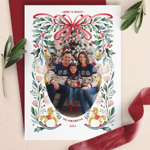 Carte de Noël photo florale avec un nœud rouge Mer