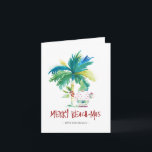 Carte de Noël Tropical Beach<br><div class="desc">Ces cartes de Noël de plage sont ornées d'un palmier exotique d'inspiration insulaire et de Père Noël de vacances mignonnes. Les mots "Merry Beach-mas" sont placés en lettres à la main. Utilisez les champs modèle pour ajouter votre salutation personnalisée. Un choix charmant à envoyer à vos amis et à votre...</div>
