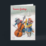 Carte de Noël Vintage, Arthur Thiele Cats<br><div class="desc">Une carte de Noël antique avec deux chats jouant du violon sur une scène hivernale. L'image est de l'artiste Arthur Thiele, dont les oeuvres de la fin du XIXe siècle sont célèbres pour la représentation d'animaux anthropomorphes - les chats en particulier - dans des scènes drôles et humaines. Avant de...</div>