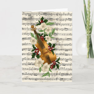 Carte de Noël violon sur la feuille de musique