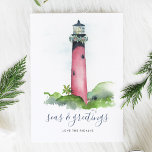 Carte de Noël Watercolor Lighthouse Beach<br><div class="desc">Cette carte de vacances nautique a été conçue en utilisant ma couleur d'eau peinte à la main Jupiter, phare de Floride avec une guirlande de verdure et des baies rouges sur un arrière - plan blanc immaculé. Les mots Seas et Greutages sont placés dans une typographie de script de brosse...</div>