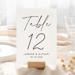 Carte de numéro de table de Mariage de script noir<br><div class="desc">Cartes de numéro de table mariage simple et moderne avec "Table" affichées dans un script noir manuscrit avec un arrière - plan blanc (ou une couleur de votre choix). Pour commander les cartes de table en noir et blanc : ajoutez votre nom, votre date de mariage et votre numéro de...</div>