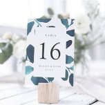 Carte de numéro de table personnalisée en botaniqu<br><div class="desc">Les cartes de numéro de tableau botanique chic sont dotées d'une bordure de feuillage bleu turquoise foncé, encadrant votre numéro de tableau. Personnalisez avec vos noms et votre date de mariage, ou nommez chaque table pour une touche personnelle supplémentaire. Le design se répète à l'envers. Coordonnée avec notre suite de...</div>
