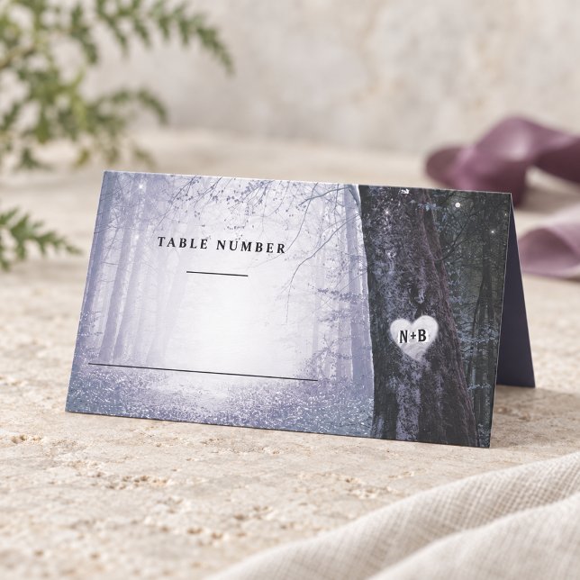 Carte De Placement Evermore | Forêt Enchantée | Numéro de Table Viole (Purple Evermore enchanted forest folded table seating card with personalized woodland artwork, styled for a romantic wedding. Styling props are not included.)