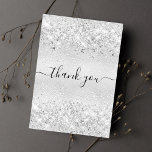 Carte De Remerciements Anniversaire argent parties scintillant poussière<br><div class="desc">Un carte de remerciements d'anniversaire féminin et élégant. Une couleur arrière - plan à l'aspect métallique faux argenté. Avec de la poussière de parties scintillant fausse. Sur l'avant grand main écriture et le texte : Merci. Retour : Personnalisez et ajoutez Votre note de remerciement et votre nom. Le nom est...</div>