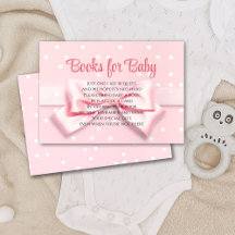 Bébé fille à ruban rose avec livres à pois pour bé