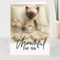 Café à la gorgée de chat en Lit