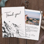 Carte De Remerciements Mariage photo rustique de la forêt de montagne<br><div class="desc">Envoyez ces cartes de remerciements à votre invité pour avoir participé à votre journée spéciale. L'avant de la carte présente un croquis en noir et blanc dessiné à la main d'une forêt de pins de montagne, complété par la légende personnalisable "Merci !" en caractères de calligraphie noire. Le dos est...</div>