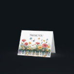 Carte De Remerciements Mélodies en fleurs<br><div class="desc">Illustration d'aquarelle fantaisiste représentant un clavier de piano entrelacé de fleurs sauvages rouges, jaunes et blancs éclatants. Les papillons flottent gracieusement au-dessus, accompagnés de notes musicales flottantes, tandis qu'un petit oiseau perche au milieu des fleurs. Des éclaboussures douces de couleurs jaillissent du piano, se mélangeant à un arrière - plan...</div>