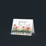 Carte De Remerciements Mélodies en fleurs<br><div class="desc">Illustration d'aquarelle fantaisiste représentant un clavier de piano entrelacé de fleurs sauvages rouges, jaunes et blancs éclatants. Les papillons flottent gracieusement au-dessus, accompagnés de notes musicales flottantes, tandis qu'un petit oiseau perche au milieu des fleurs. Des éclaboussures douces de couleurs jaillissent du piano, se mélangeant à un arrière - plan...</div>