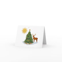 Sapin de Noël avec cadeaux de rennes et étoile dor