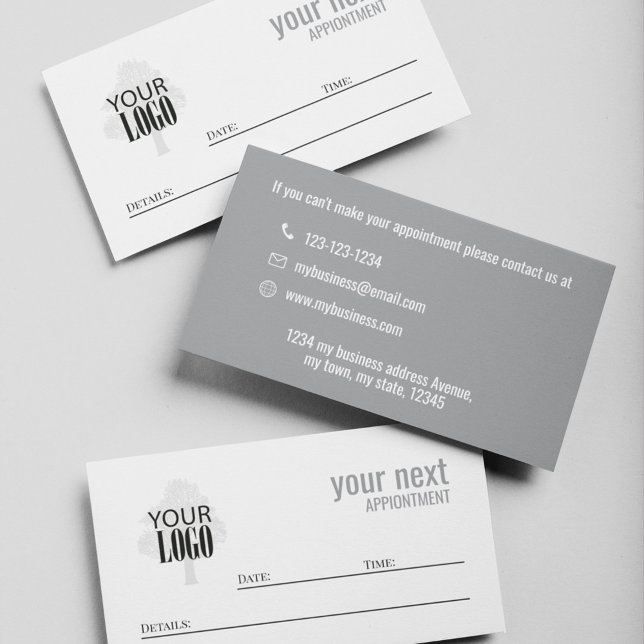 Carte de rendez-vous simple avec logo d'entreprise (Grey and white business cards with company logo placement.)