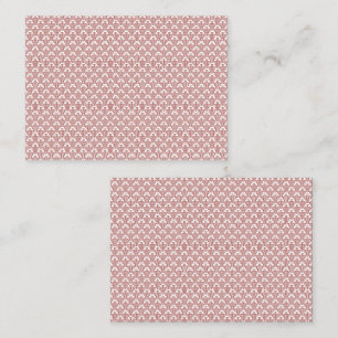Carte De Rendez-vous Un tapis à motifs rouge et marron se trouve sur