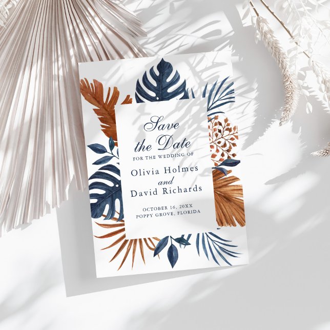 Carte de sauvegarde de date Bleu Minuit Monstera (Midnight Blue Monstera Save the Date Card on a sunny white table with neutral dry flowers)