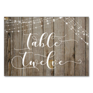 Carte de table douze en bois brun patiné et lumièr
