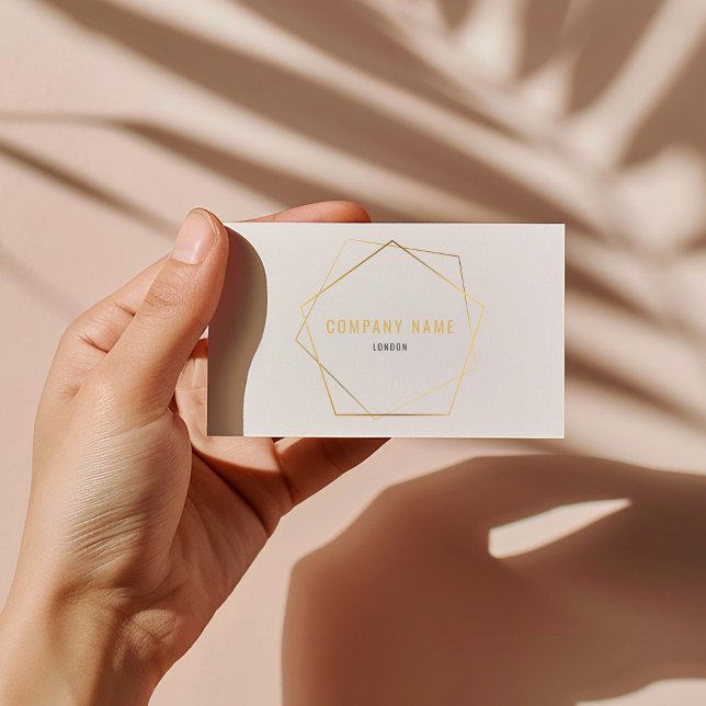 Carte De Visite Effet géométrique or (Modern business card with luxury gold effect geometric pentagon and elegant script.)