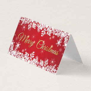 Carte De Visite Flocons de neige blancs sur un joyeux Noël rouge