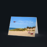 Carte de voeux Beach Père Noël<br><div class="desc">Un voeu de Noël fantaisiste avec Père Noël et son traîneau sur la plage avec un avion de skywriting volant un joyeux message de Noël.</div>