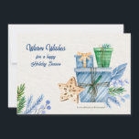 Carte de vœux bleue pour la période des fêtes<br><div class="desc">Une carte de vacances à l'aquarelle représentant des cadeaux, des branches de pin, des baies et un ornement en forme d'étoile. (Image de pikisuperstar sur Freepik). La carte est facile à personnaliser avec votre texte, police et couleur de police. Vous ne trouvez pas exactement ce que vous cherchez ? Tous...</div>