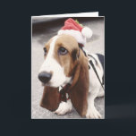 Carte de voeux Christmas Basset Hound à Santa Hat<br><div class="desc">Sweet Basset hound avec un casquette Père Noël allumé.</div>