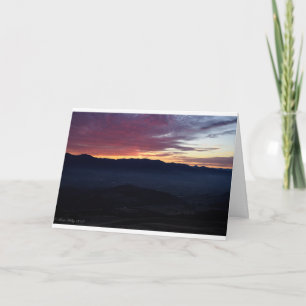 Carte de vœux Coucher de soleil vierge sur les mon