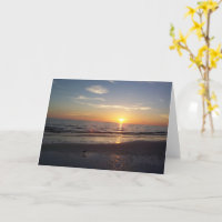 Carte de vœux de coucher de soleil sur la plage