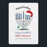Carte de vœux de fêtes avec une menorah et un bonn<br><div class="desc">Une carte de vœux pour les fêtes de Hanouka et de Noël qui présente une menorah et le chapeau du Père Noël. Parfait pour la foule de la "saison des fêtes". (Conçu par Rawpixel.com). (Conçu par Freepik). (Conçu par Freepik). La carte est facile à personnaliser avec votre libellé, police et...</div>