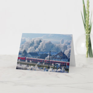 Carte de vœux de saison de fêtes avec des souhaits