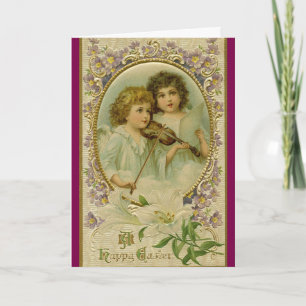 Carte de vœux de vacances de deux anges avec violo