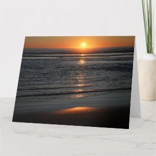 Carte de vœux photo du coucher de soleil de la côt