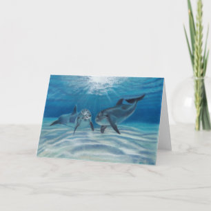 Carte de voeux pour les dauphins de broyage bleu