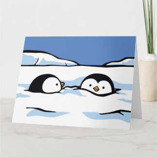 Carte de voeux profonde de neige de pingouin