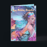 Carte de vœux sirène aquarelle bleu océan<br><div class="desc">Carte d'anniversaire de sirène aquarelle dans la mer. Ce design aquarelle comporte beaucoup de bleu et de rose. Le fond comporte des vagues océaniques et un ciel coloré. La sirène porte ses cheveux relevés avec un bandeau de fleurs. Plongez dans l'enchantement ! Parfait pour les amateurs de sirènes. Illuminez la...</div>