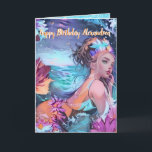 Carte de vœux sirène aquarelle bleu océan<br><div class="desc">Carte d'anniversaire sirène aquarelle dans la mer. Ce dessin aquarelle comporte beaucoup de bleu et de rose. Le fond présente des vagues océaniques et un ciel coloré. La sirène porte les cheveux relevés avec un bandeau de fleurs. Plongez dans l'enchantement ! Parfait pour les amateurs de sirènes. Illuminez la journée...</div>