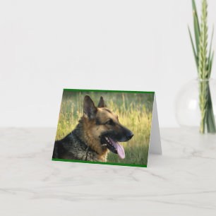 Carte de vœux vierge verte avec chiot berger allem