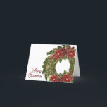 Carte de voeux Vintage Christmas Poinsettias Wreat<br><div class="desc">Cet élégant design vintage comprend une couronne de Noël ornée de poinsettias. Cliquez sur le bouton personnaliser pour plus de flexibilité dans la modification du texte et des graphiques! Des variantes de cette conception ainsi que des produits de coordination sont disponibles dans notre boutique, zazzle.com/store/doodlelulu. Contactez-nous si vous avez besoin...</div>