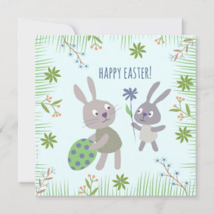 Carte Deux lapins de Pâques avec oeuf et fleur.