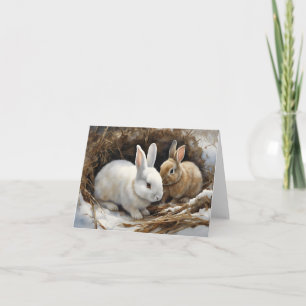 Carte Deux lapins mignons blottis dans la couverture de 
