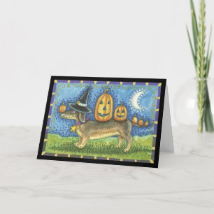 Carte d'Halloween avec sorcière chien et citrouill