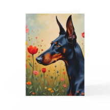 Doberman dans un champ de fleurs