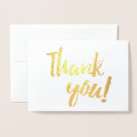 Carte Dorée Merci Gold Foil Pinceau blanc brosse Script<br><div class="desc">Cette belle carte est parfaite pour toute note de remerciement ! L'avant de la carte contient les mots "Merci !" en feuille d'or sur un arrière - plan blanc, en police de script de brosse (brosse). L'intérieur de la carte est vide, prêt pour votre message personnel. Convient pour les cadeaux...</div>