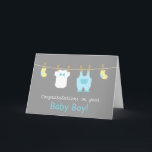 Carte Elegant and Cute Baby Boy Clothes<br><div class="desc">Send your congratulations and well wishes to the new parents of a newborn baby boy with these mini baby clothes and accessories greeting card! This modern design in pastel colours includes cute baby items like yellow baby socks, a white baby jumpsuit with a bow tie and a pastel blue overalls...</div>
