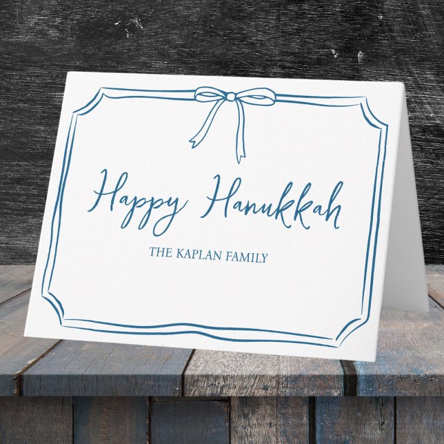Carte Elégant Bleu Bow Personnalisé Happy Hanoukka (Celebrate Hanukkah with a timeless card featuring a custom family name and elegant blue bow.)