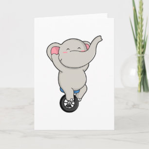 Carte Éléphant en artiste au cirque avec des pneus