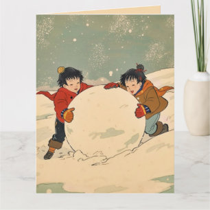 Carte Enfants japonais roulant une grosse boule de neige