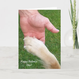Carte Fête des pères-chien patte dans la main de l'homme